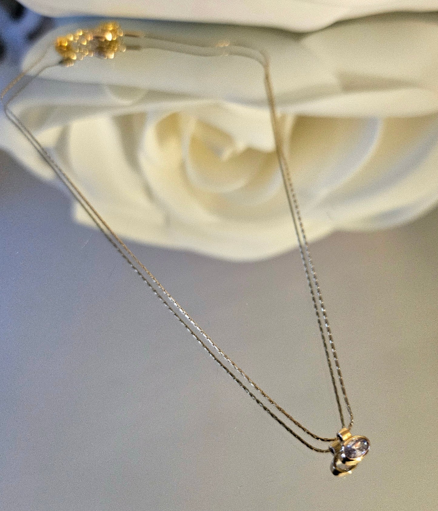 Gold plated necklace with small crystal stone
