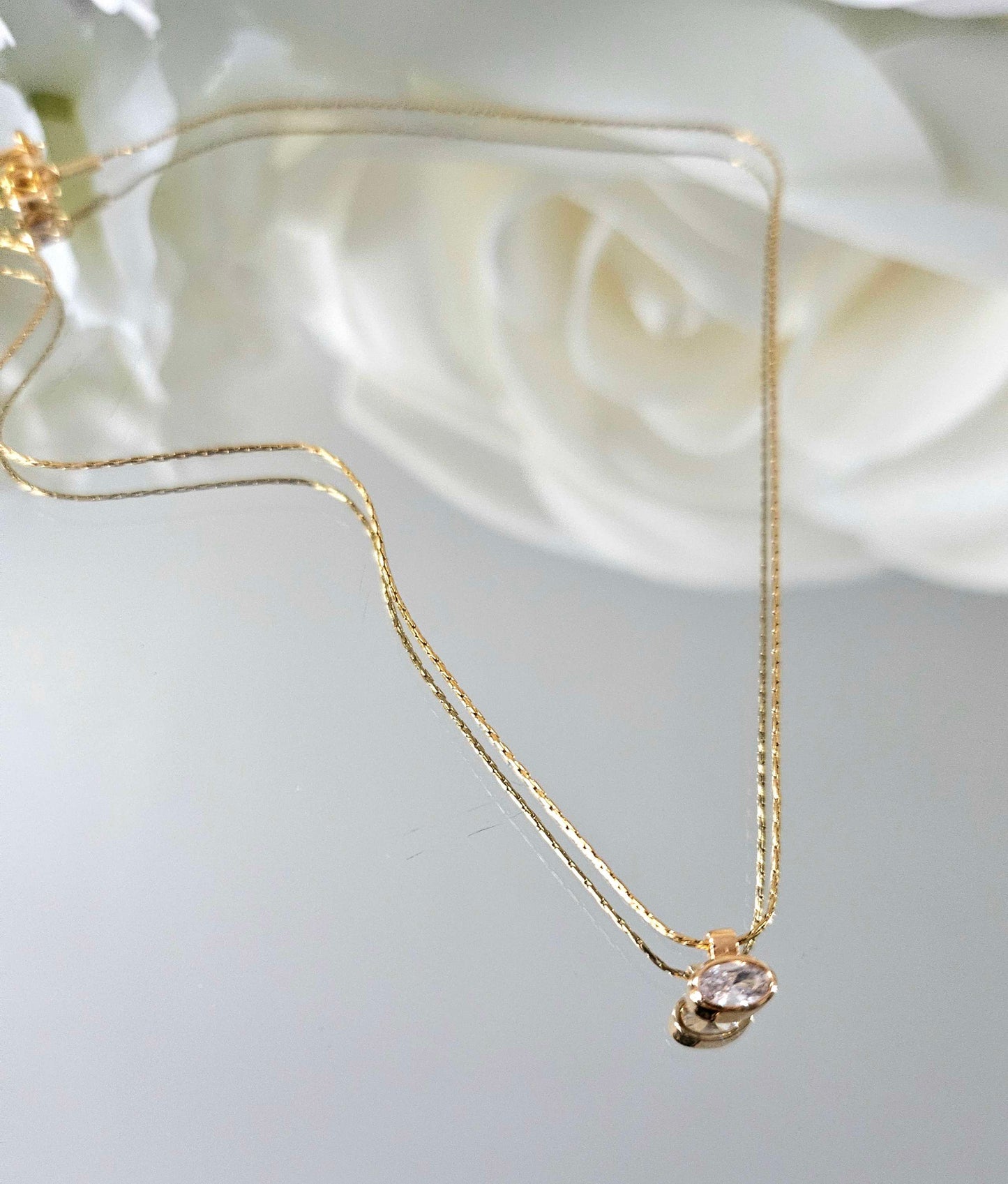 Gold plated necklace with small crystal stone