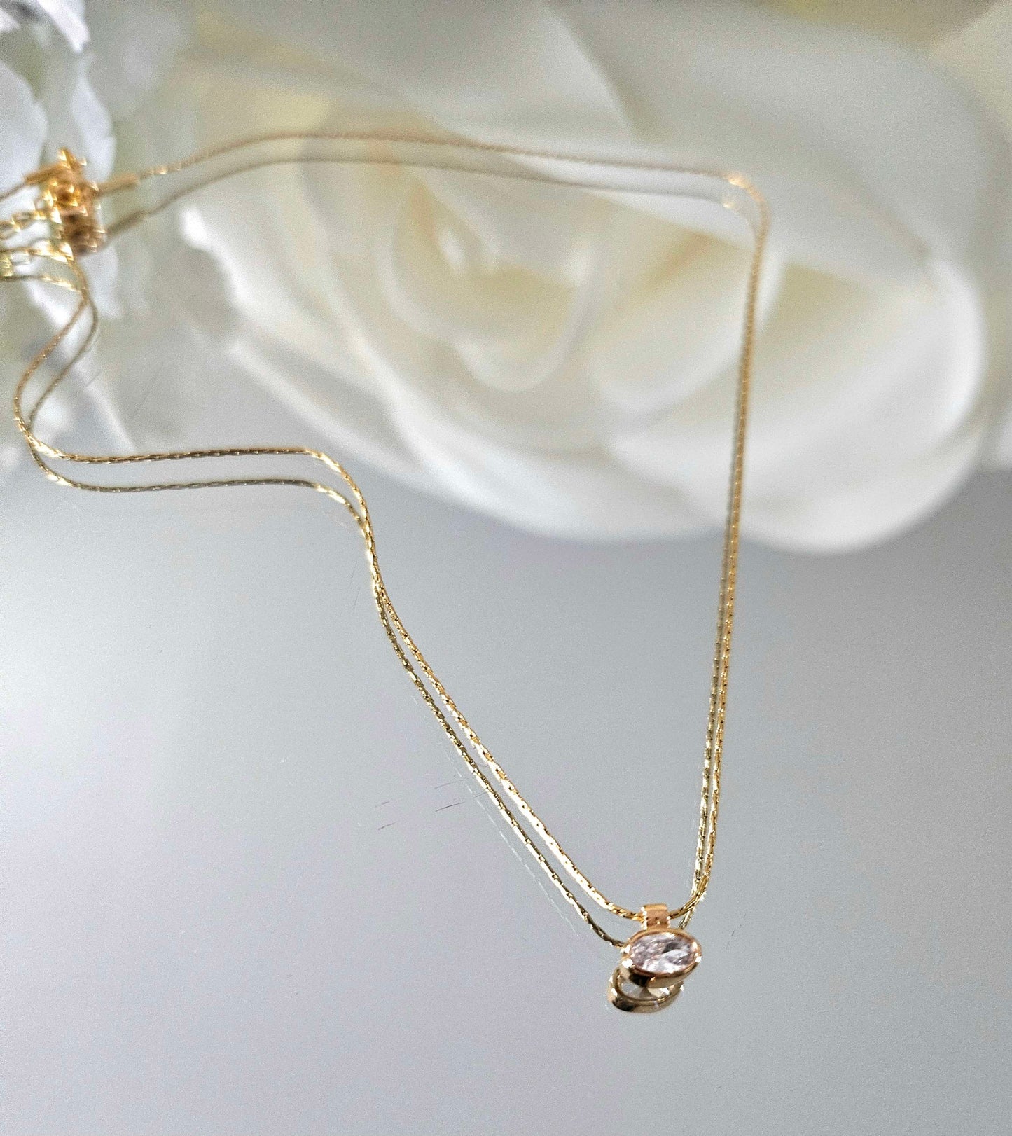 Gold plated necklace with small crystal stone