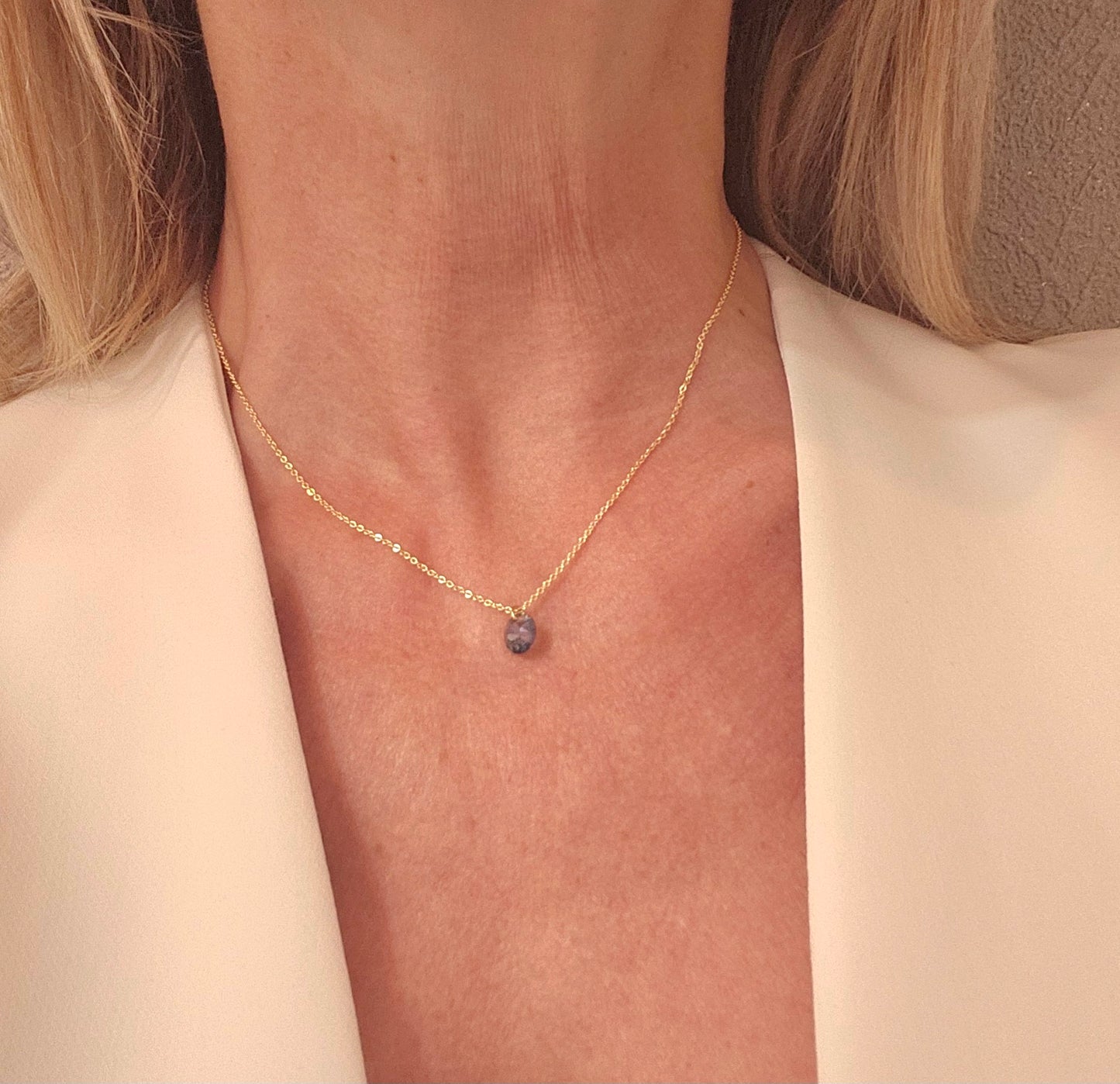Sapphire necklace enhanced by a blue cabochon crystal