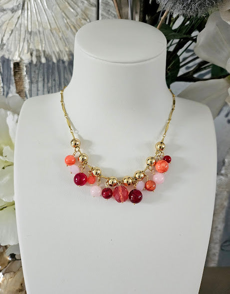 Gold plated steel madness necklace