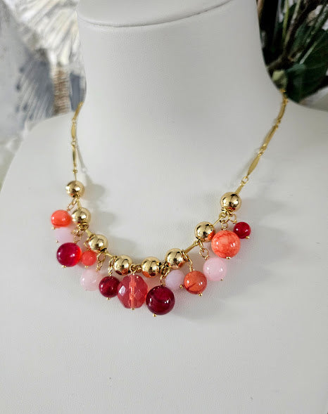 Gold plated steel madness necklace