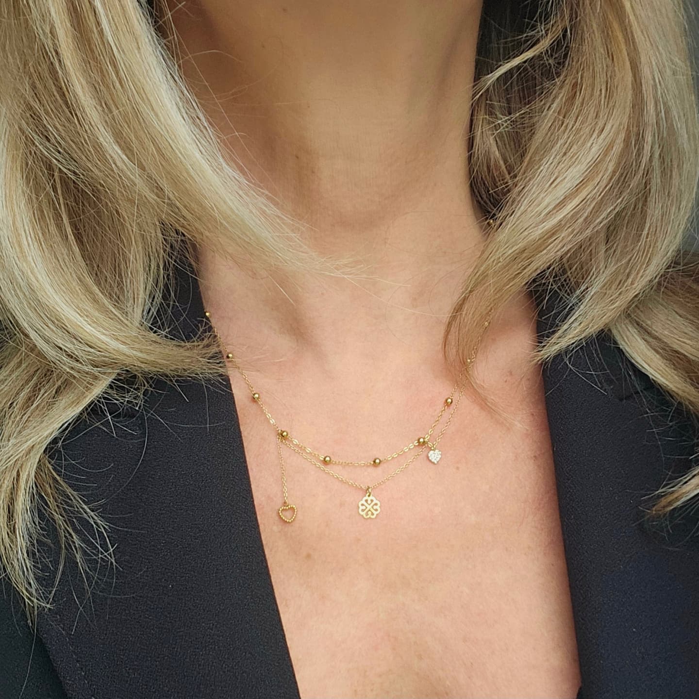 Galante gold-plated necklace – asymmetrical clover, heart and diamond heart pendants.