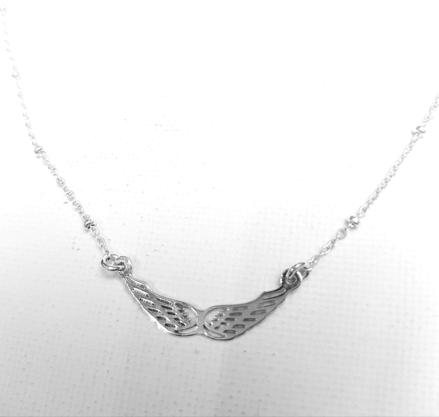 Spread wings necklace
